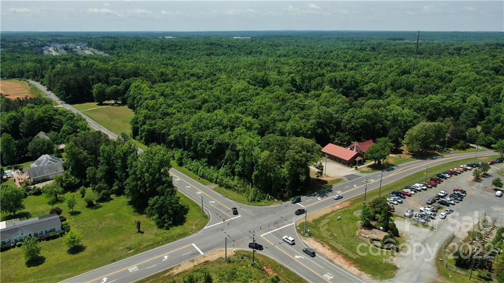 10749 Harrisburg Road Indian Land, SC 29707 - Photo 1 of 38 a view of a yard with an outdoor seating