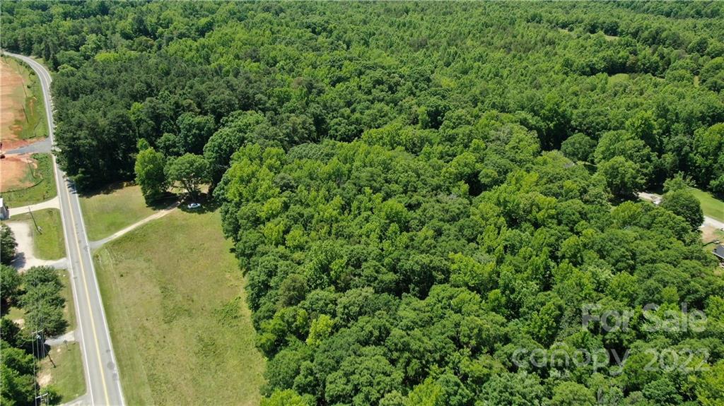 10749 Harrisburg Road Indian Land, SC 29707 - Photo 13 of 38 an aerial view of a residential houses with yard
