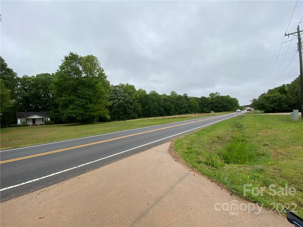 10749 Harrisburg Road Indian Land, SC 29707 - Photo 14 of 38 a view of a big yard with large trees