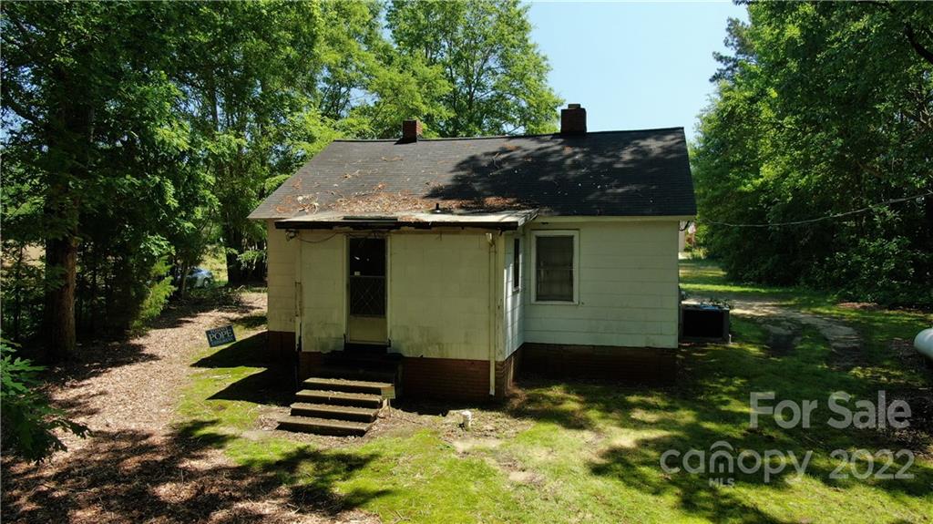 10749 Harrisburg Road Indian Land, SC 29707 - Photo 21 of 38 a view of a house with a yard