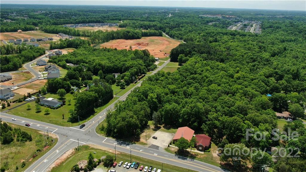 10749 Harrisburg Road Indian Land, SC 29707 - Photo 27 of 38 an aerial view of a house with yard