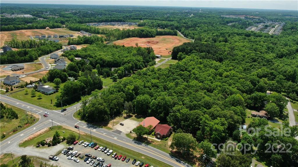 10749 Harrisburg Road Indian Land, SC 29707 - Photo 28 of 38 an aerial view of a house with a yard