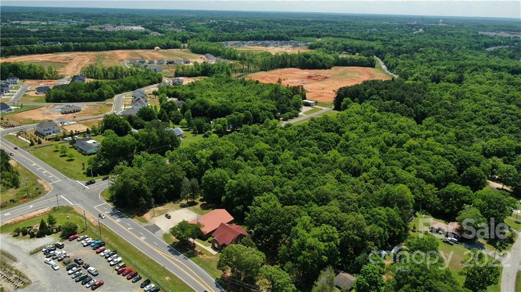 10749 Harrisburg Road Indian Land, SC 29707 - Photo 29 of 38 an aerial view of a houses with a yard