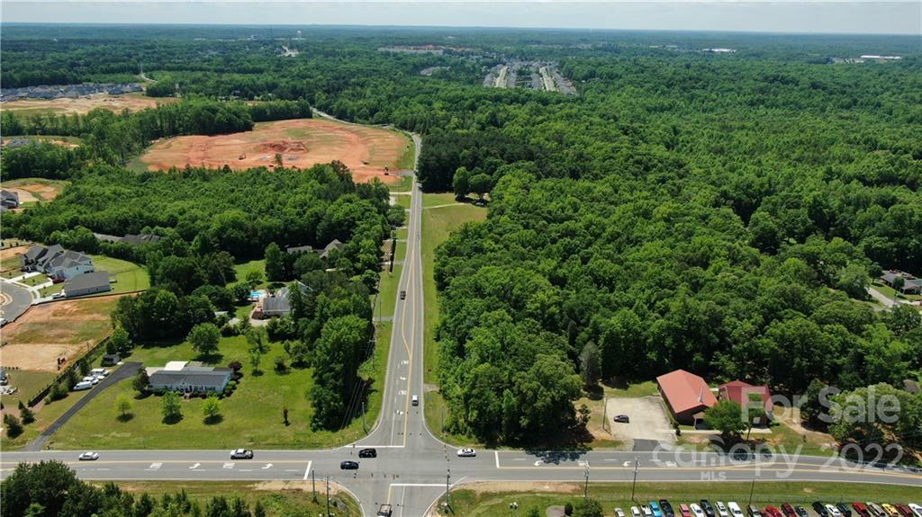 10749 Harrisburg Road Indian Land, SC 29707 - Photo 3 of 38 an aerial view of house with yard