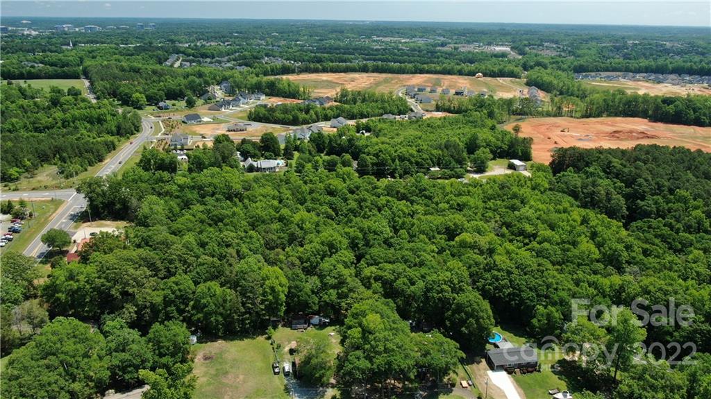 10749 Harrisburg Road Indian Land, SC 29707 - Photo 32 of 38 an aerial view of a houses with yard
