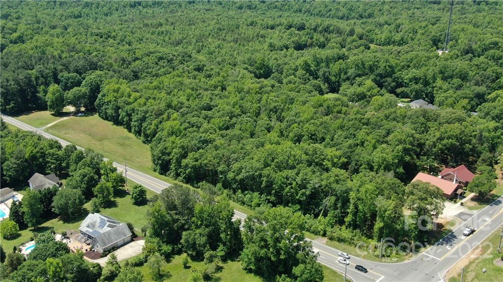10749 Harrisburg Road Indian Land, SC 29707 - Photo 4 of 38 an aerial view of a house with a yard