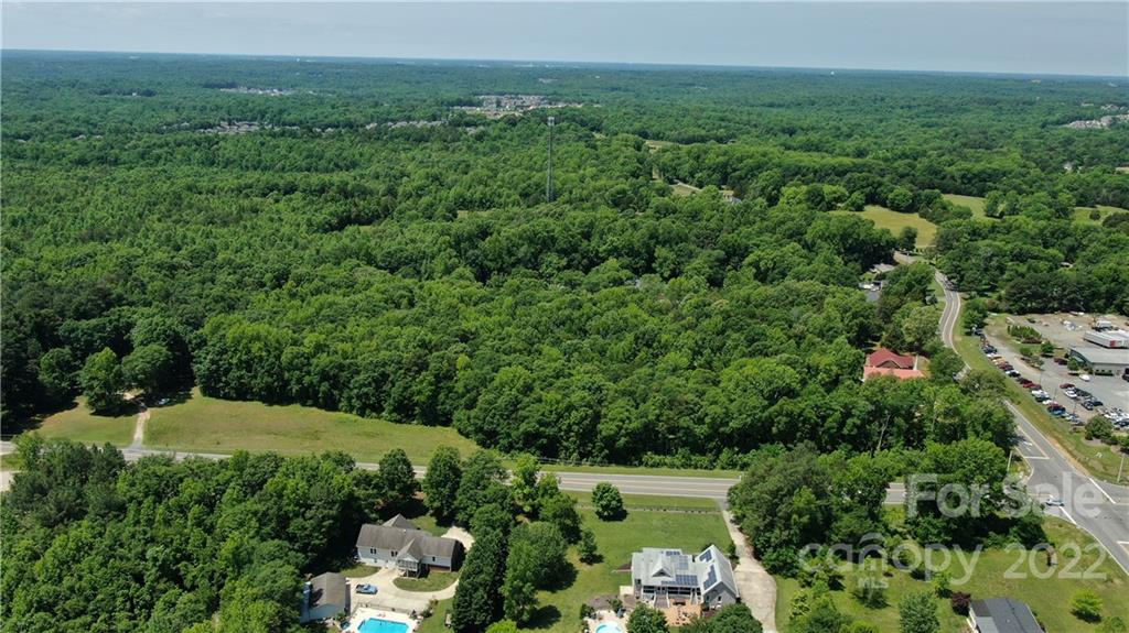 10749 Harrisburg Road Indian Land, SC 29707 - Photo 9 of 38 an aerial view of a house with a yard