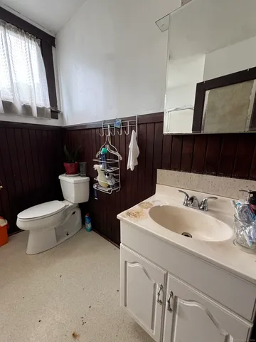 a bathroom with a sink and a toilet
