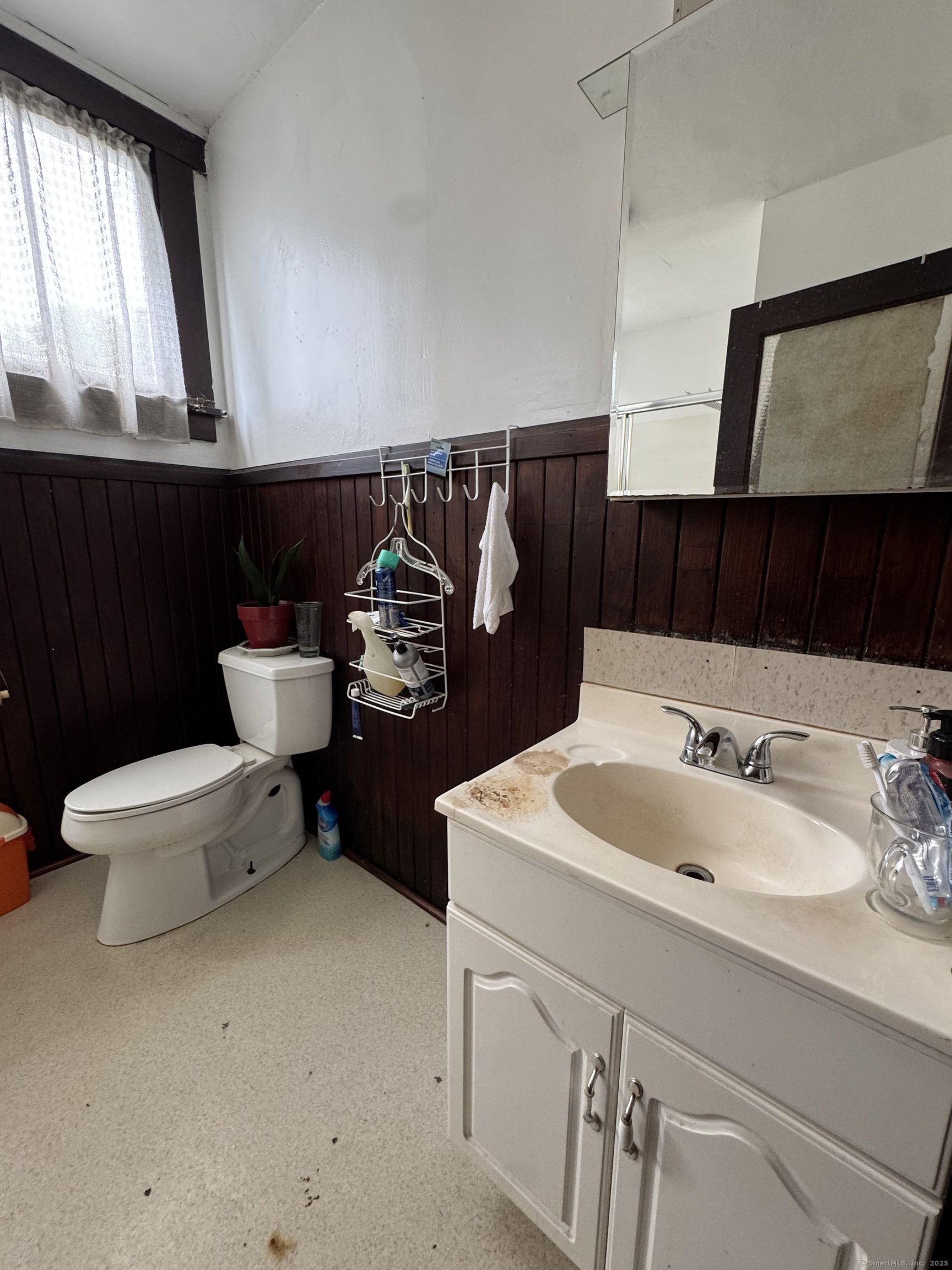 478 East Main Street Norwich, CT 06360 - Photo 14 of 19 a bathroom with a sink and a toilet