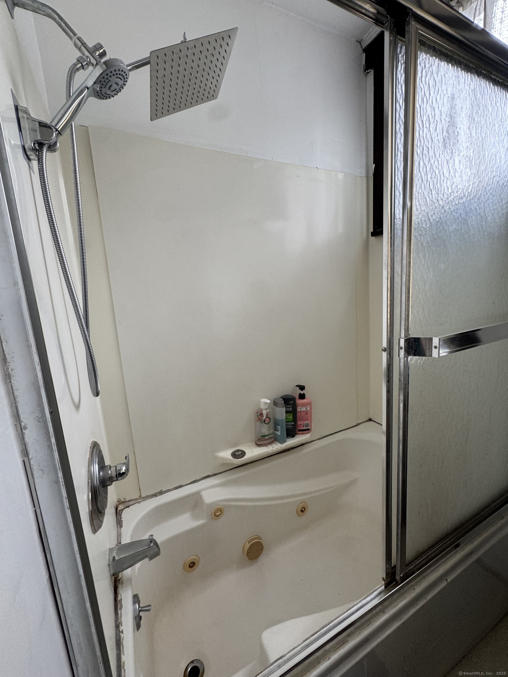 478 East Main Street Norwich, CT 06360 - Photo 15 of 19 a bathroom with a tub and a sink