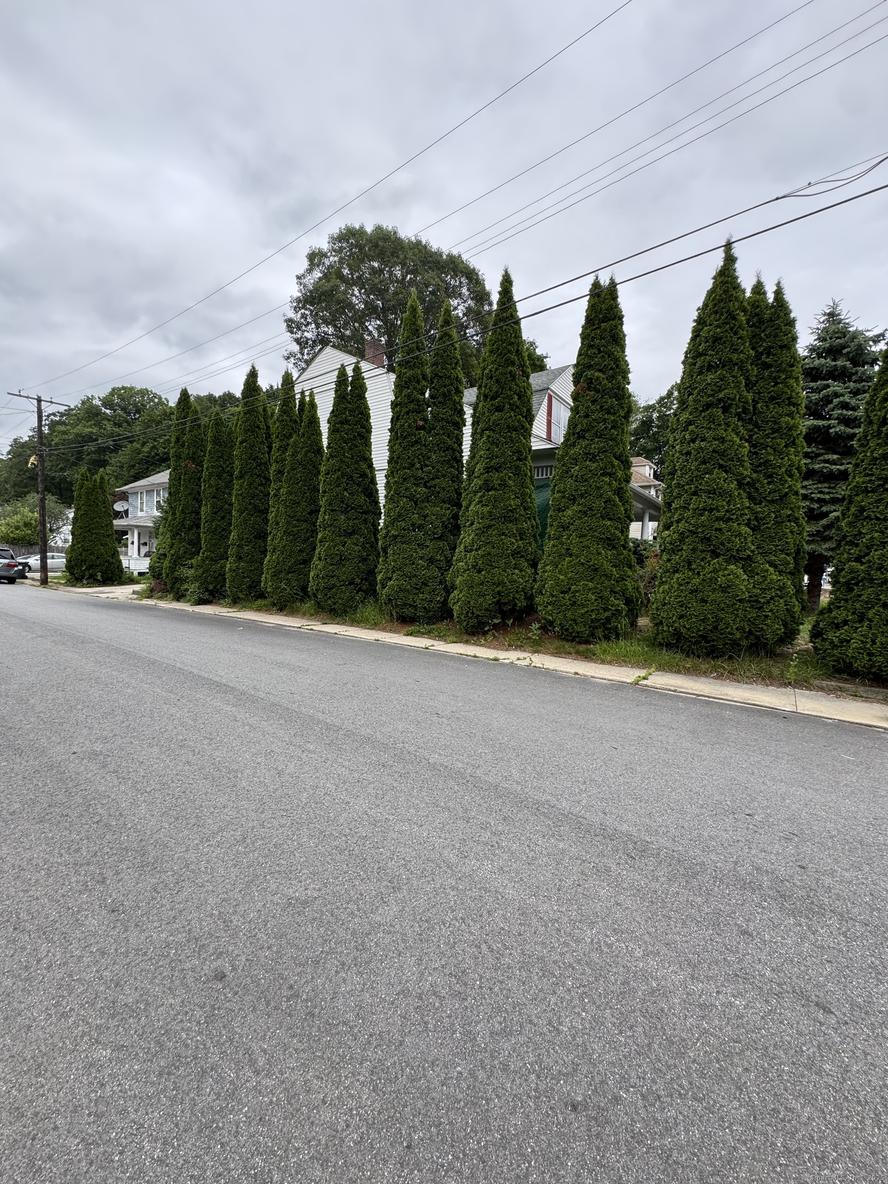 478 East Main Street Norwich, CT 06360 - Photo 19 of 19 a view of a field with trees in the background
