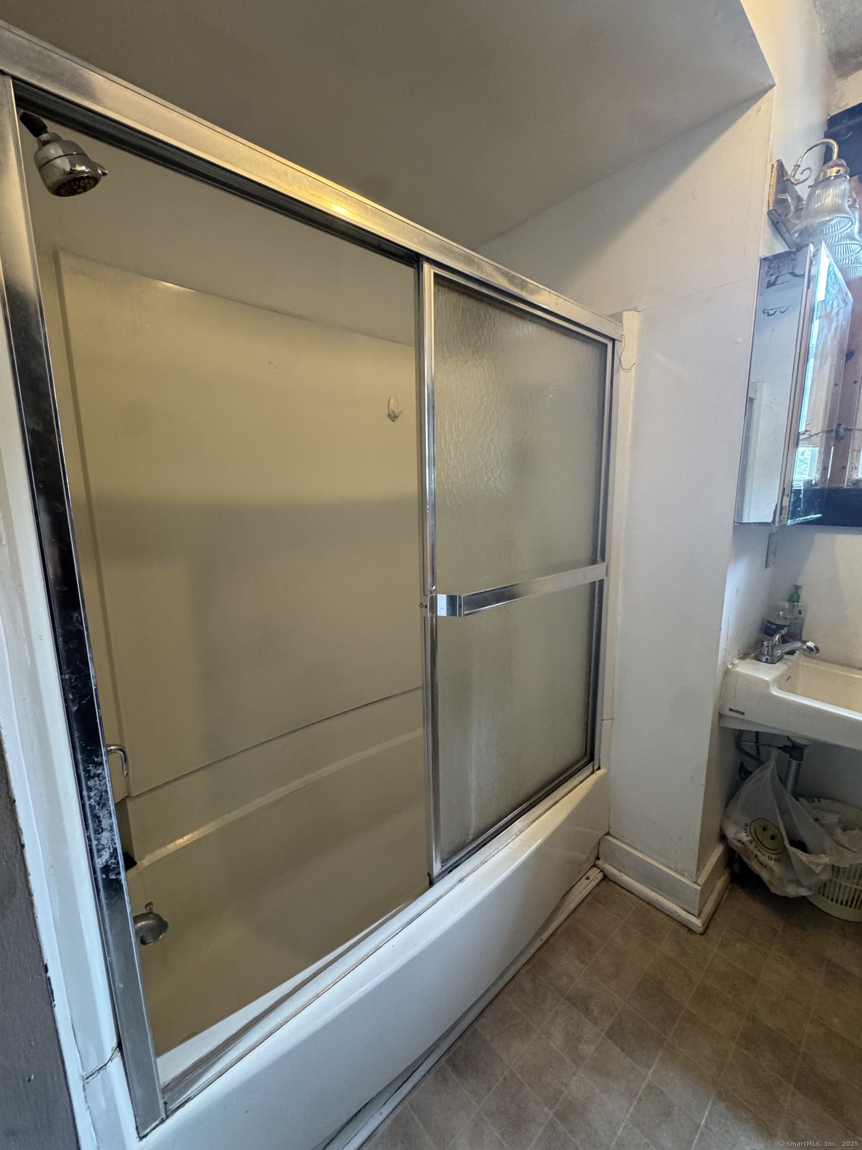 478 East Main Street Norwich, CT 06360 - Photo 6 of 19 a bathroom with a bath tub and a shower