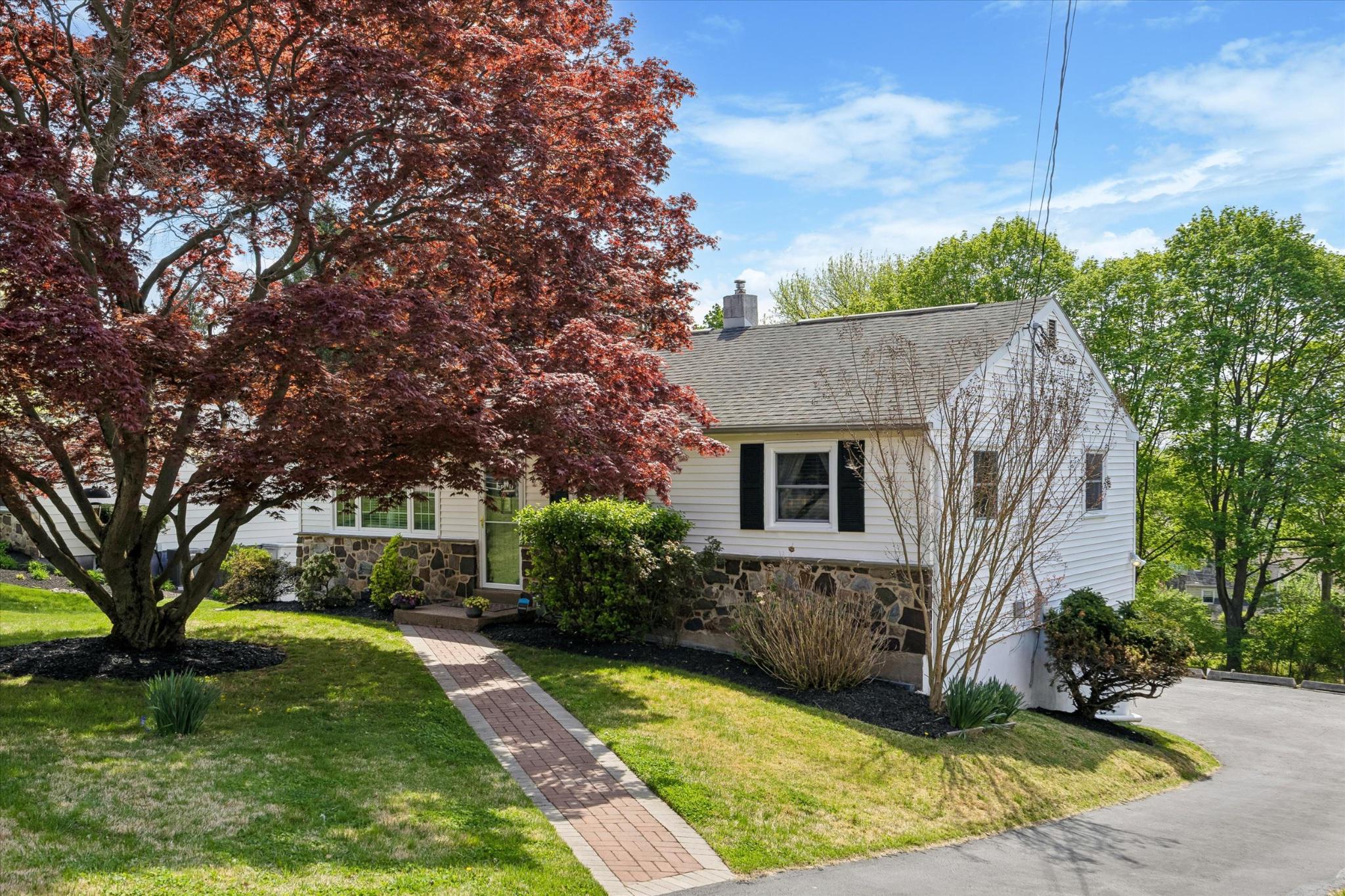 a view of a house with a yard