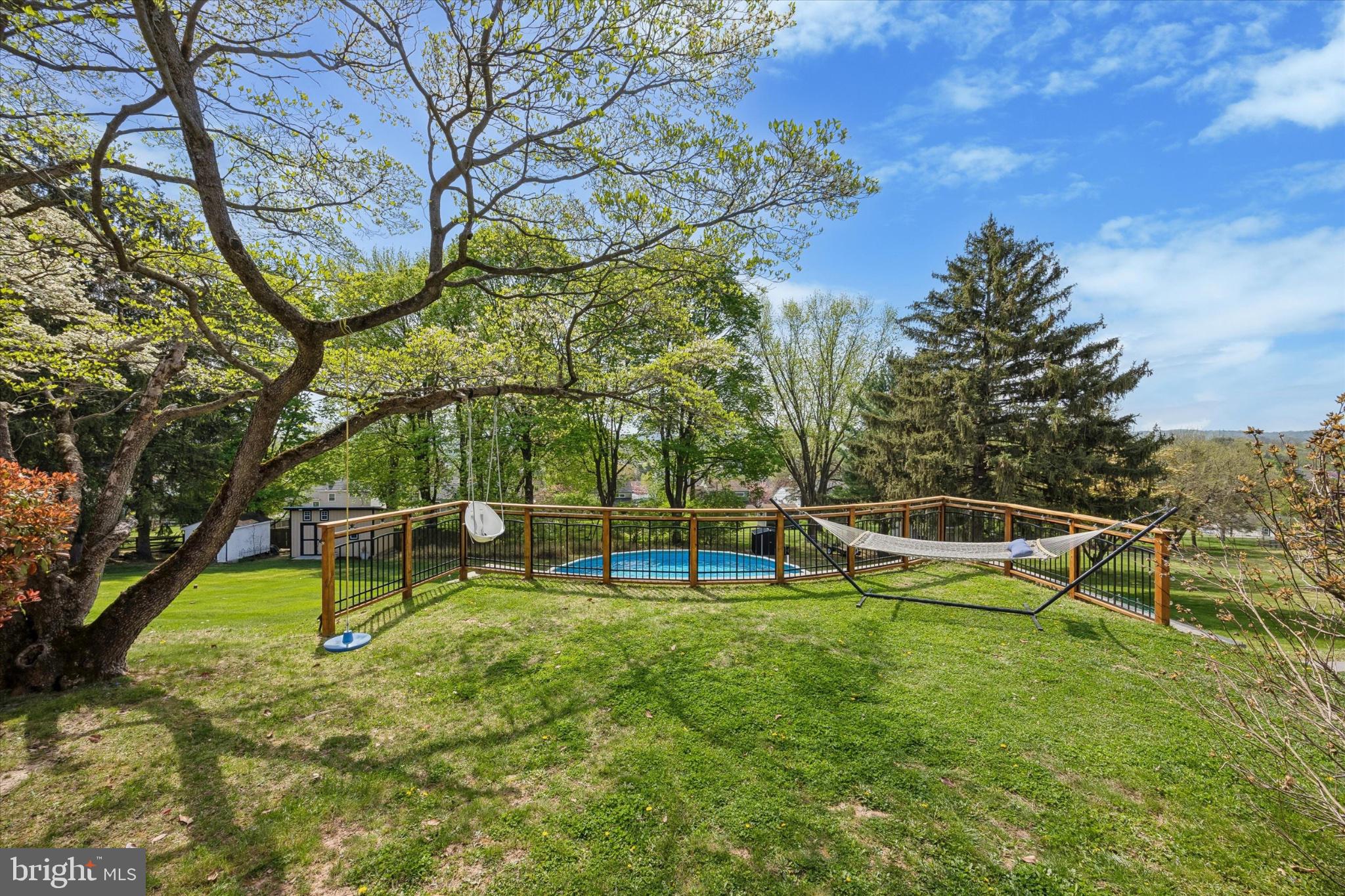 187 East Valley Forge Road King of Prussia, PA 19406 - Photo 11 of 16 a view of a house with swimming pool and sitting area