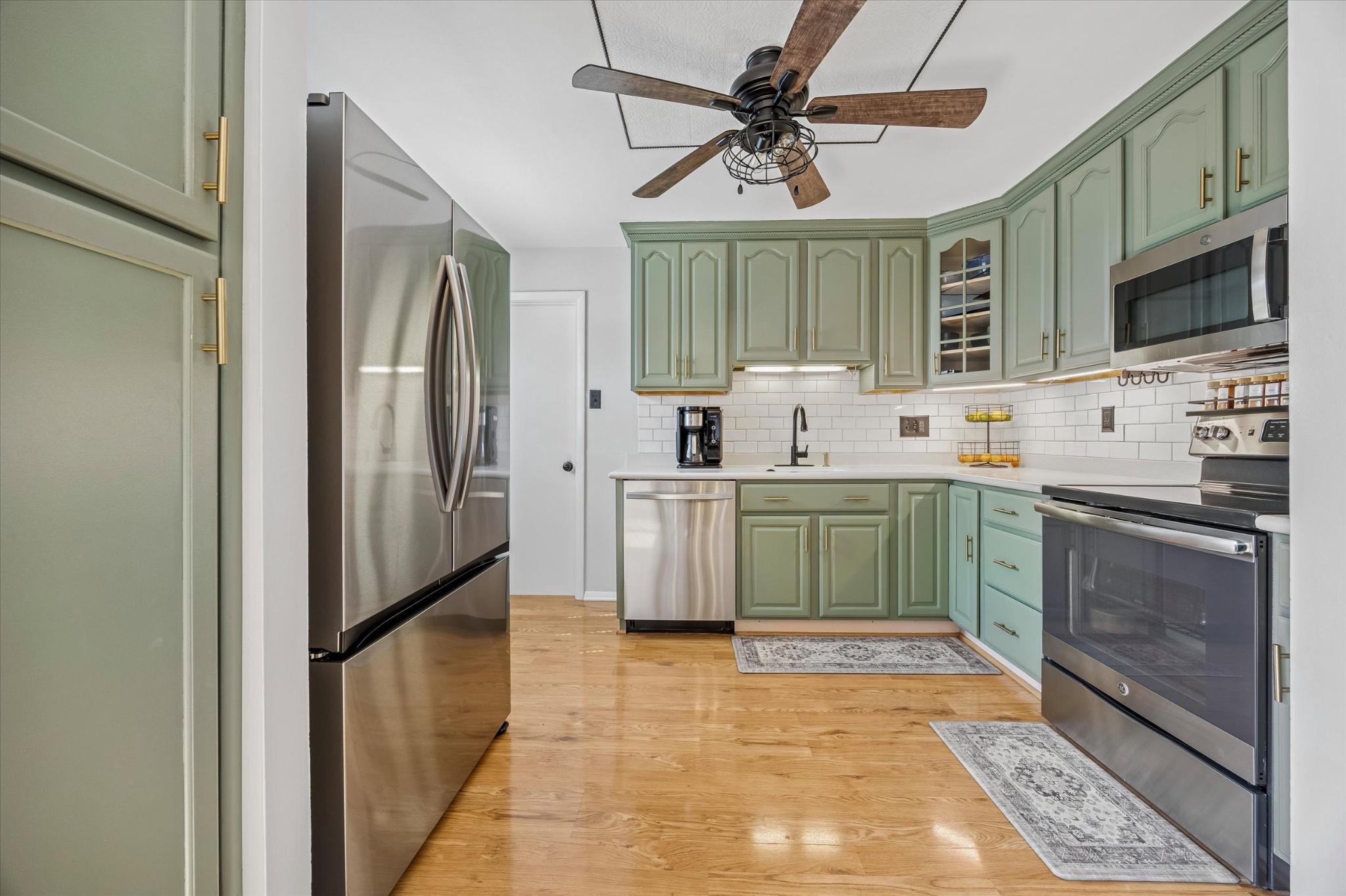 187 East Valley Forge Road King of Prussia, PA 19406 - Photo 3 of 16 a view of a kitchen with stainless steel appliances granite countertop a stove top oven a sink and dishwasher