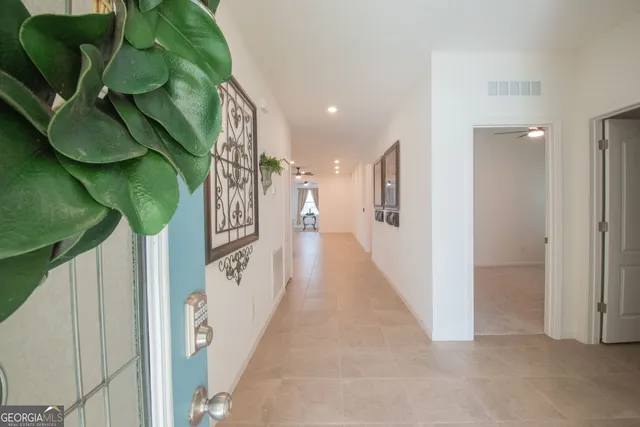 a view of a hallway with entryway