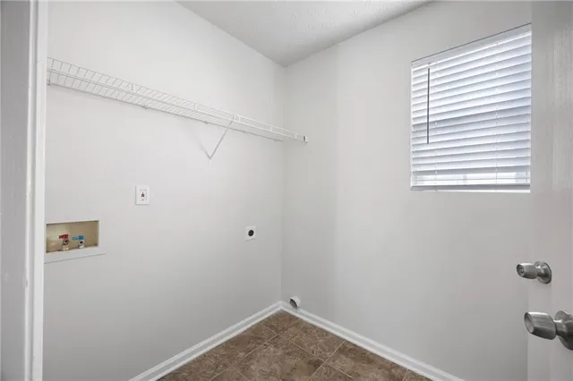 a view of a room that has a window in it