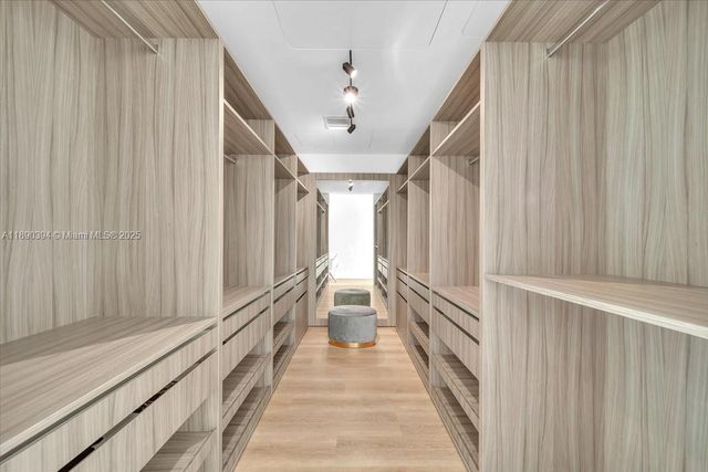 a view of a hallway with staircase