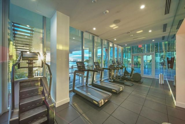 a outdoor space with furniture and large glass windows