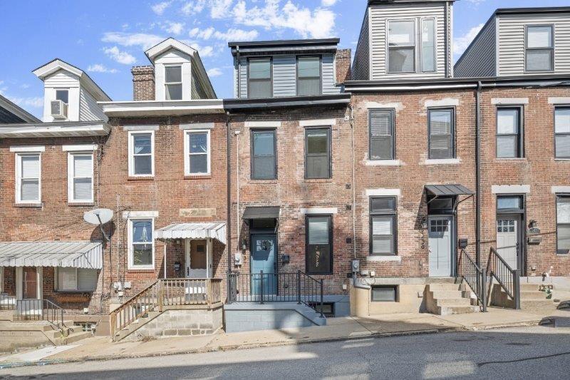 a front view of a multi story building