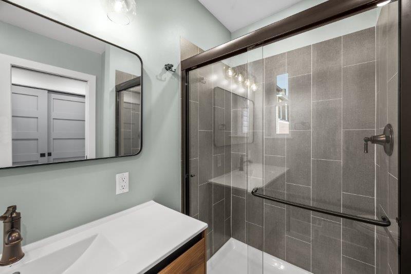 343 46th Street Pittsburgh, PA 15201 - Photo 26 of 40 a bathroom with a sink and mirror