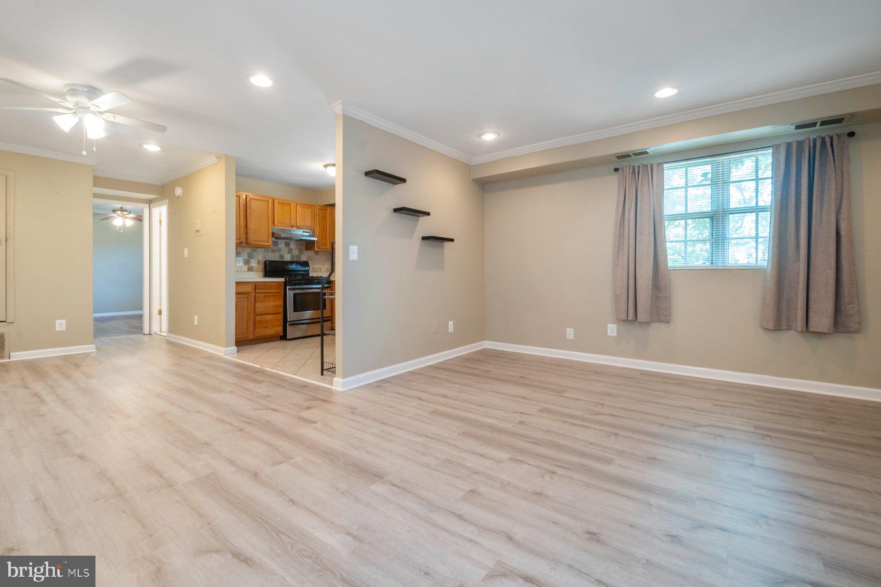 11906 Tarragon Road, Unit H Reisterstown, MD 21136 - Photo 8 of 24 Living room/kitchen