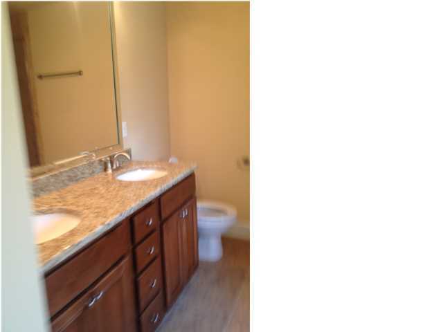 20 Topside Drive Inlet Beach, FL 32461 - Photo 9 of 13 a bathroom with a granite countertop sink and a toilet