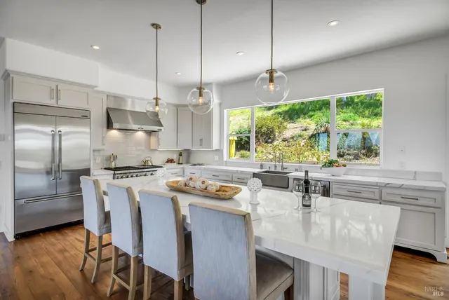 a view of a city with lush green forest