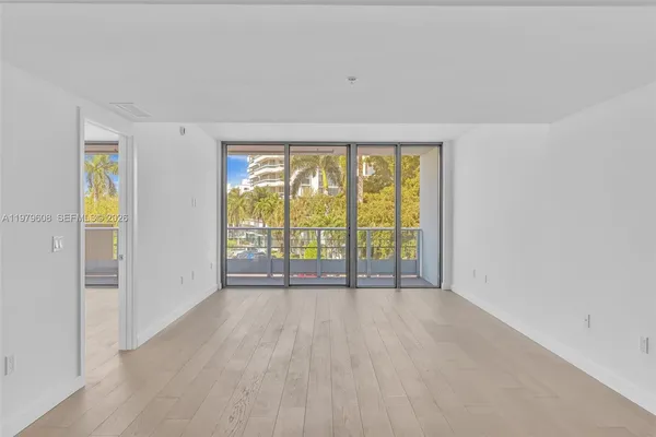 wooden floor in an empty room with window