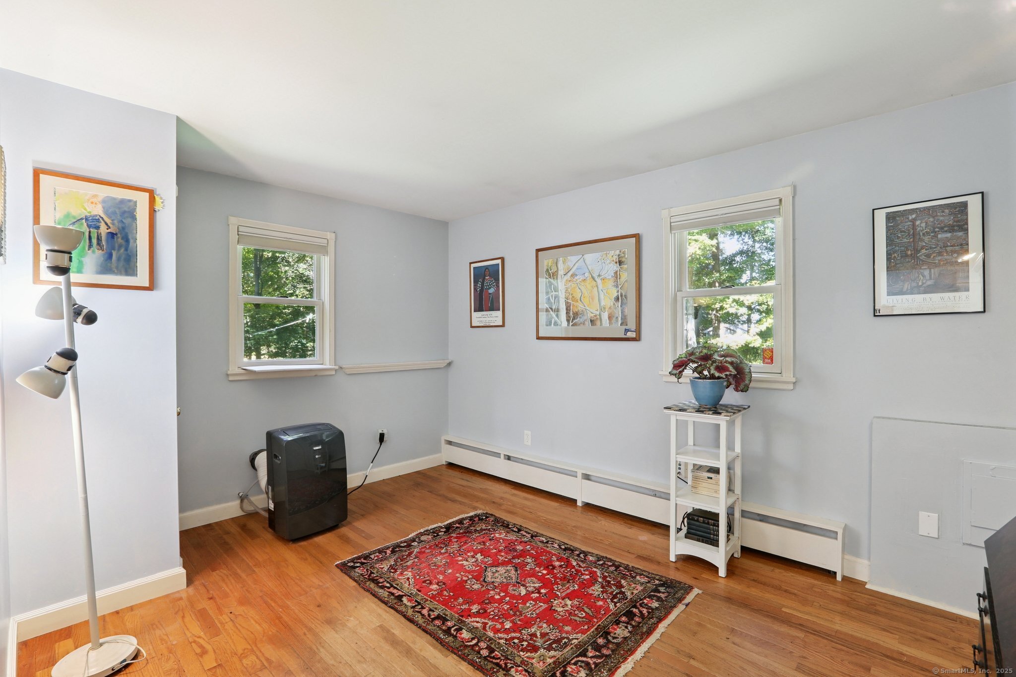 62 Walnut Hill Road Bethel, CT 06801 - Photo 12 of 39 a living room with furniture and a rug