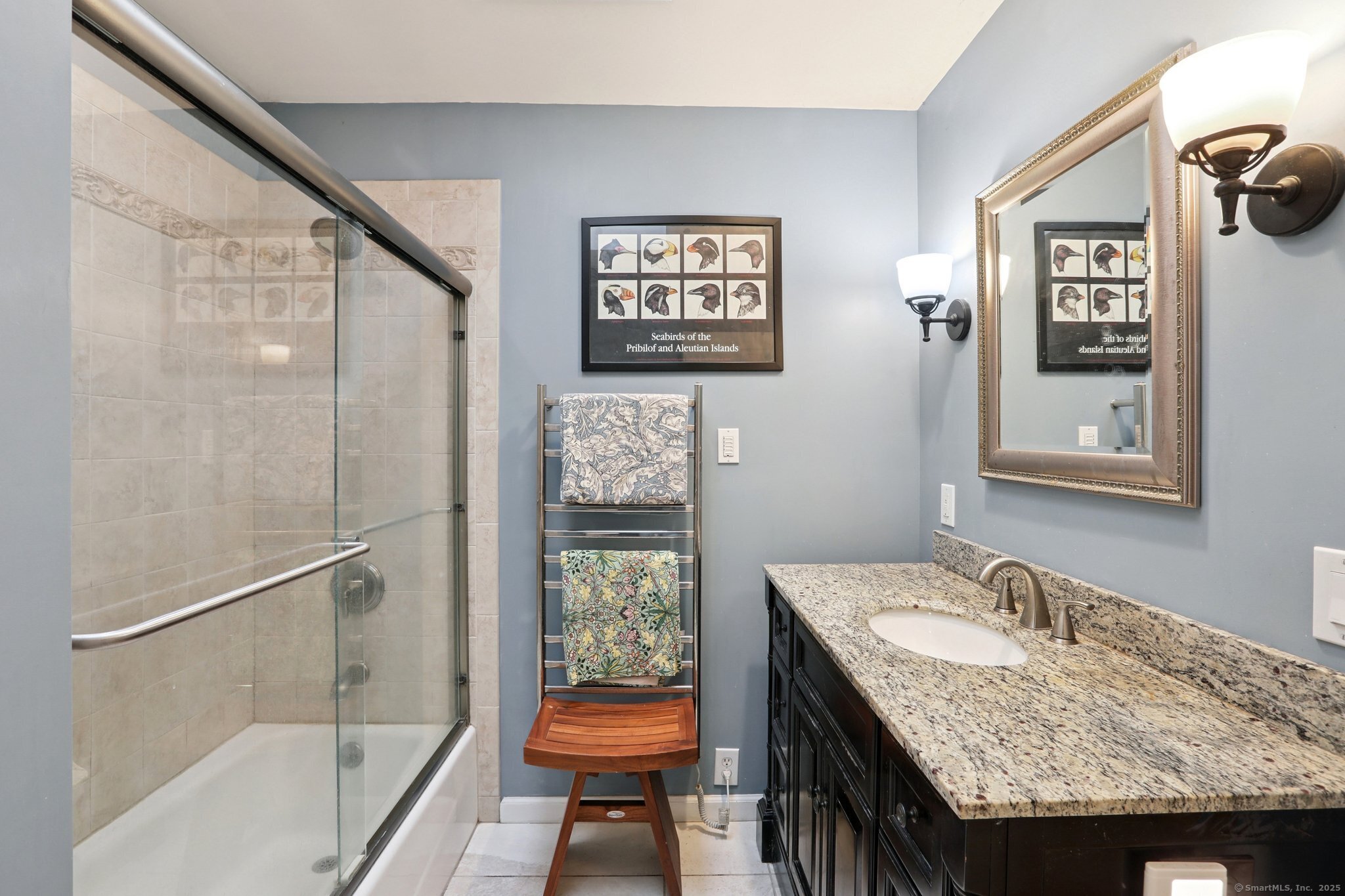 62 Walnut Hill Road Bethel, CT 06801 - Photo 28 of 39 a bathroom with a granite countertop sink and a mirror