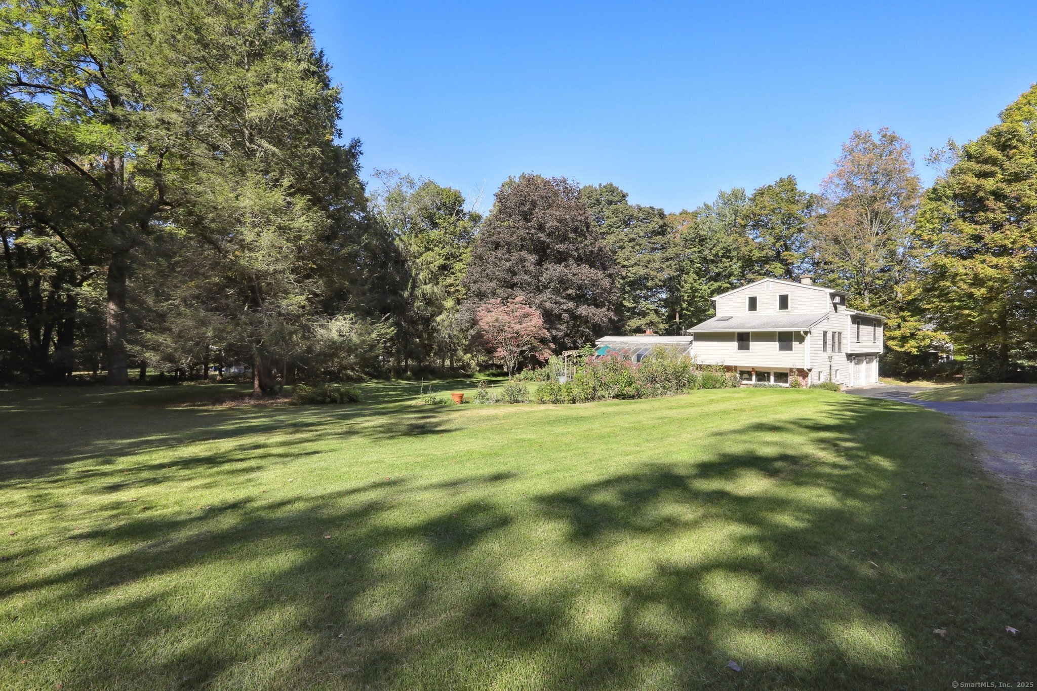 62 Walnut Hill Road Bethel, CT 06801 - Photo 32 of 39 a view of a tiny house with a big yard