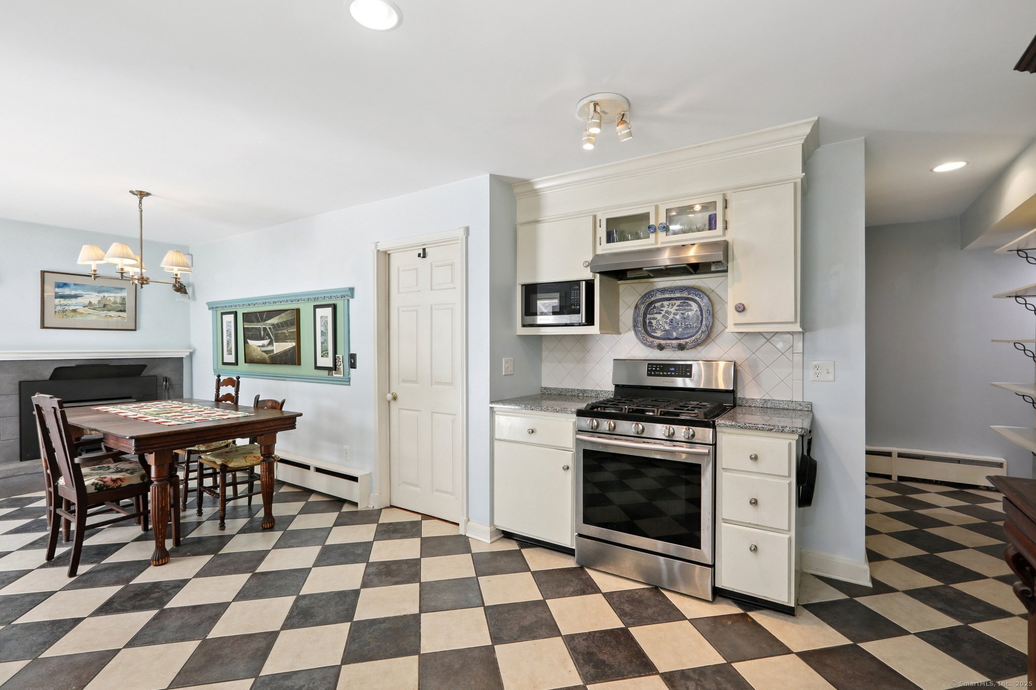 62 Walnut Hill Road Bethel, CT 06801 - Photo 8 of 39 a kitchen with a stove a sink and a refrigerator