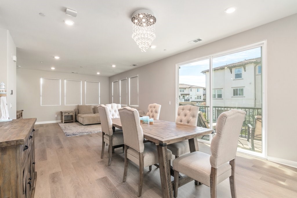 3573 Conner Way Oceanside, CA 92056 - Photo 11 of 25 a view of a dining room with furniture window and outside view
