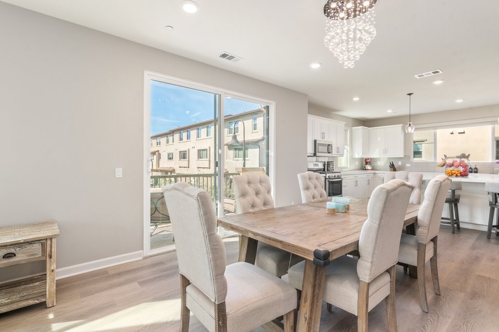 3573 Conner Way Oceanside, CA 92056 - Photo 12 of 25 a view of a dining room with furniture window and outside view