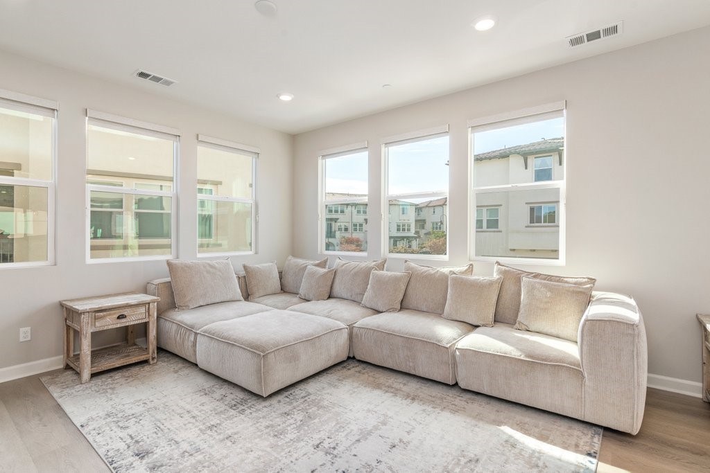 3573 Conner Way Oceanside, CA 92056 - Photo 15 of 25 a living room with furniture and windows