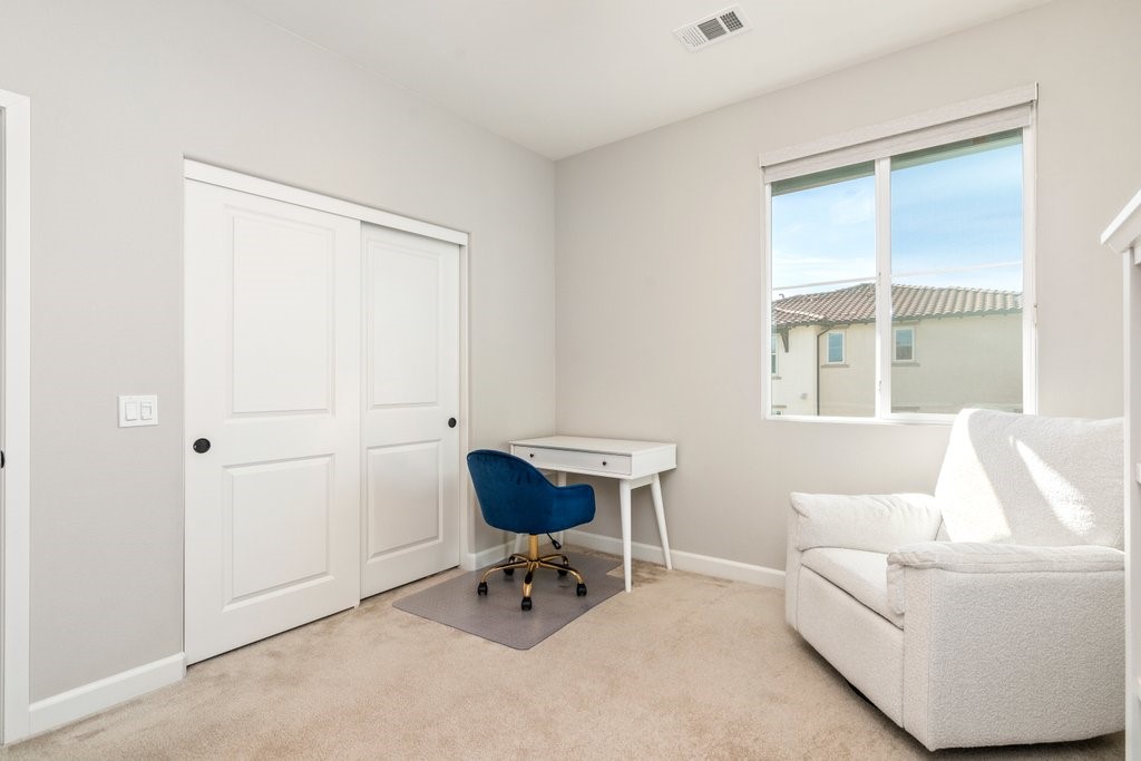 3573 Conner Way Oceanside, CA 92056 - Photo 19 of 25 a living room with furniture and a window