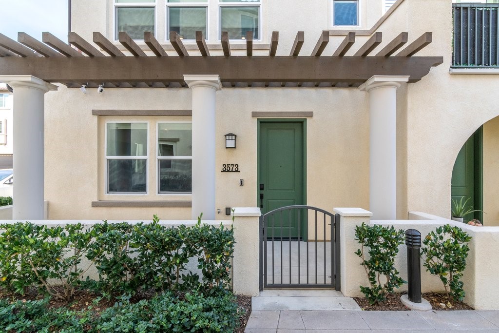 3573 Conner Way Oceanside, CA 92056 - Photo 2 of 25 a front view of a house with a yard