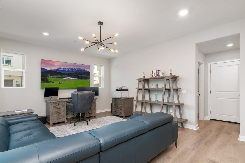 3573 Conner Way Oceanside, CA 92056 - Photo 4 of 25 a living room with furniture and a fireplace
