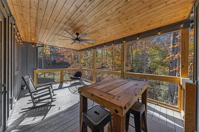 a view of house with backyard