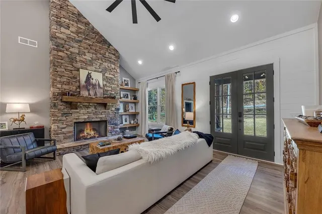 a bed room with furniture and a fireplace