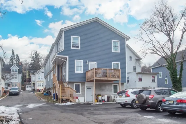 a view of a street with cars