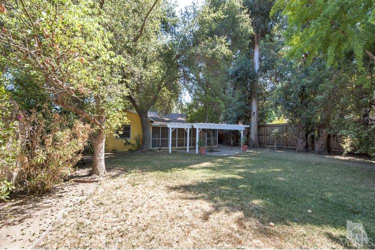 4739 Libbit Avenue Encino, CA 91436 - Photo 13 of 13 front view of a house with a yard