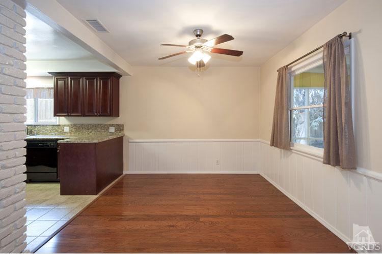 4739 Libbit Avenue Encino, CA 91436 - Photo 4 of 13 a view of kitchen with a sink cabinet and a window