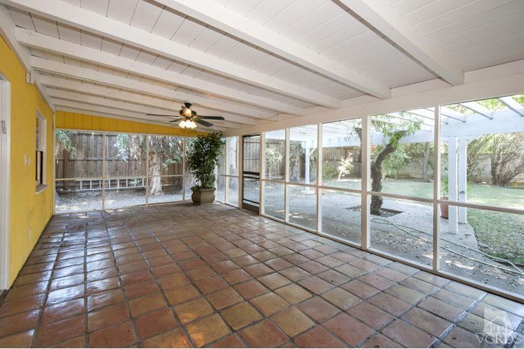 4739 Libbit Avenue Encino, CA 91436 - Photo 10 of 13 a view of empty room with wooden floor and fan