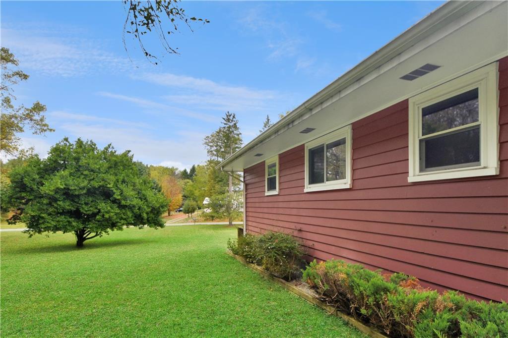 222 Gas Company Road Mount Morris, PA 15349 - Photo 12 of 34 a front view of a house with garden