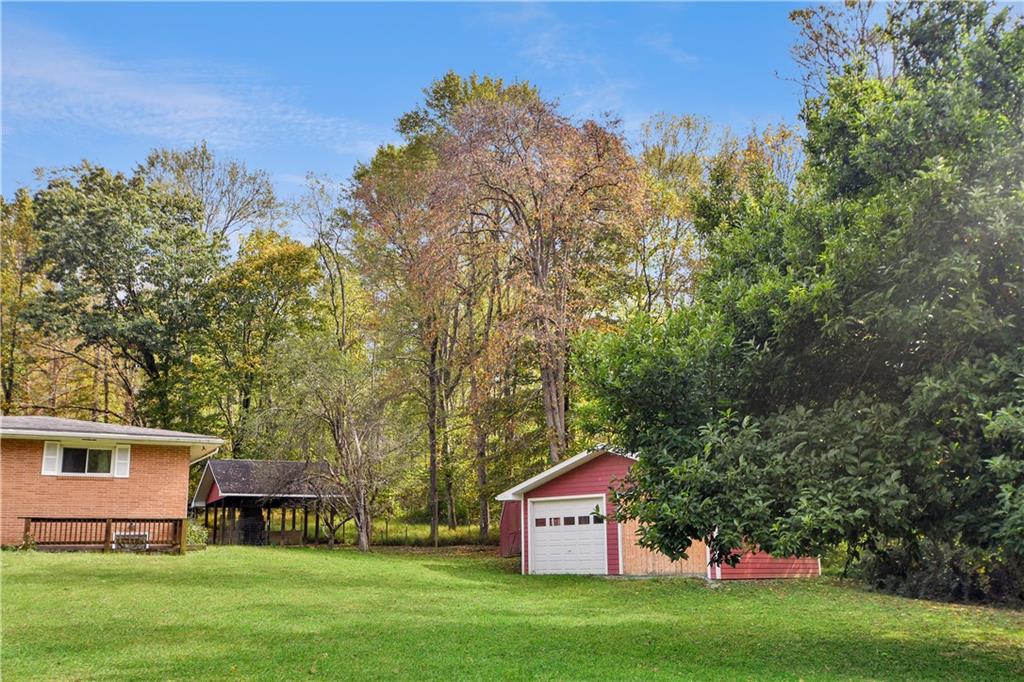 222 Gas Company Road Mount Morris, PA 15349 - Photo 15 of 34 a view of a house with a backyard