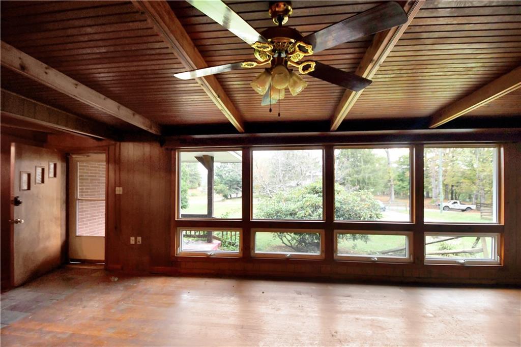 222 Gas Company Road Mount Morris, PA 15349 - Photo 17 of 34 a view of room with furniture and large windows