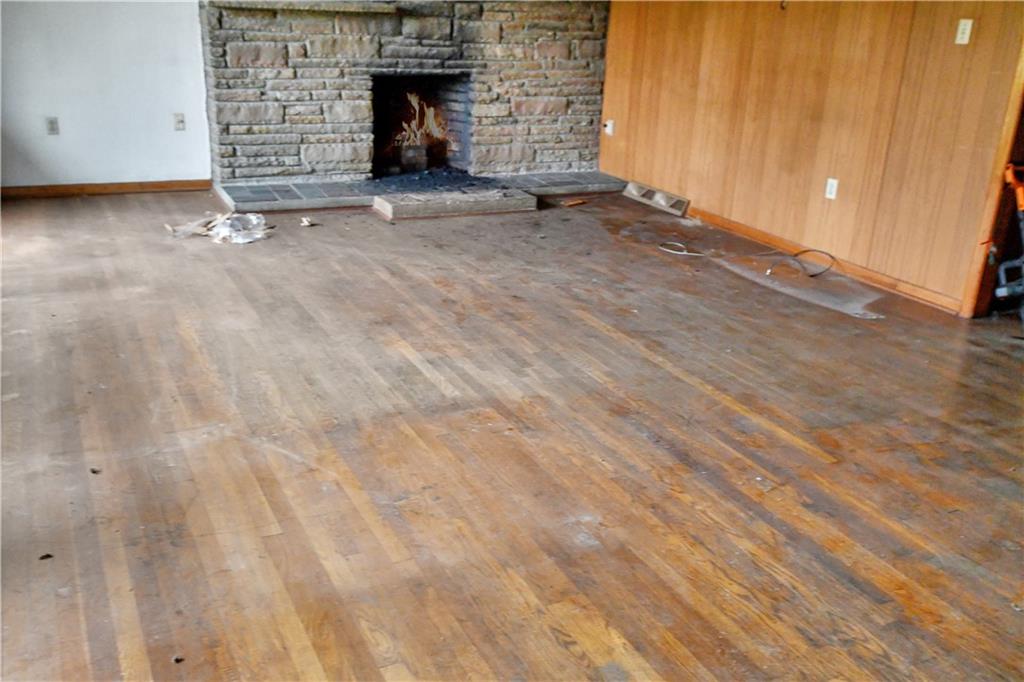 222 Gas Company Road Mount Morris, PA 15349 - Photo 19 of 34 a view of an empty room with a fireplace