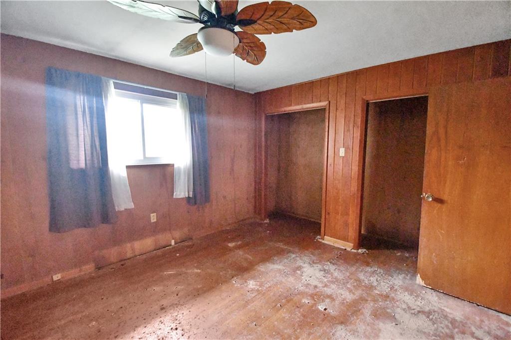 222 Gas Company Road Mount Morris, PA 15349 - Photo 23 of 34 a view of a livingroom with a chandelier fan and a window